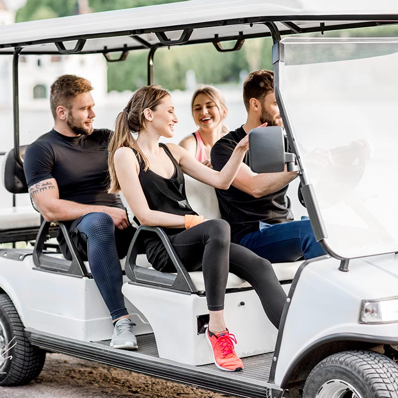friends in 6 person golf cart