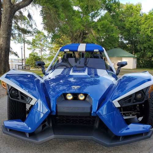 blue manual slingshot with top